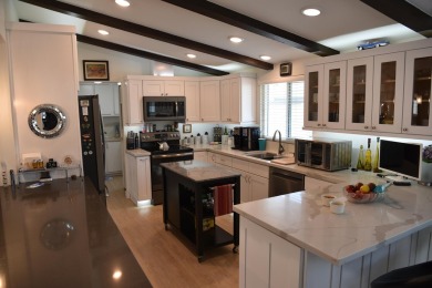 Palm Desert Greens 55+ You own the land!. This Triple Wide home on Palm Desert Greens Country Club in California - for sale on GolfHomes.com, golf home, golf lot