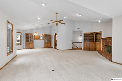 Experience the warmth of a close-knit neighborhood of around 100 on Woodland Hills Golf Course in Nebraska - for sale on GolfHomes.com, golf home, golf lot
