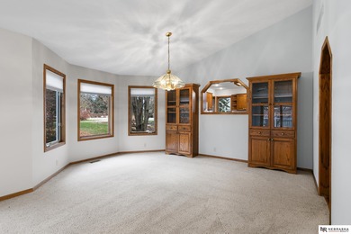 Experience the warmth of a close-knit neighborhood of around 100 on Woodland Hills Golf Course in Nebraska - for sale on GolfHomes.com, golf home, golf lot