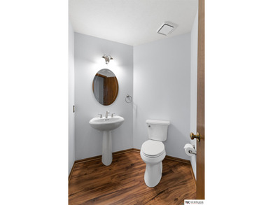 Experience the warmth of a close-knit neighborhood of around 100 on Woodland Hills Golf Course in Nebraska - for sale on GolfHomes.com, golf home, golf lot