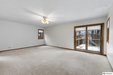 Experience the warmth of a close-knit neighborhood of around 100 on Woodland Hills Golf Course in Nebraska - for sale on GolfHomes.com, golf home, golf lot