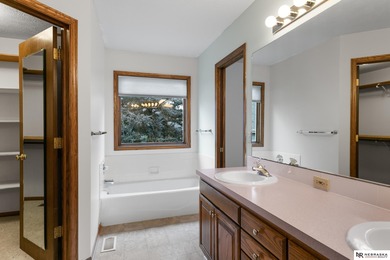 Experience the warmth of a close-knit neighborhood of around 100 on Woodland Hills Golf Course in Nebraska - for sale on GolfHomes.com, golf home, golf lot