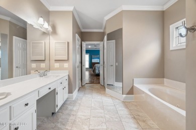 Welcome to your dream lifestyle in this show-stopping 3-bedroom on Hernando Hills Country Club in Mississippi - for sale on GolfHomes.com, golf home, golf lot
