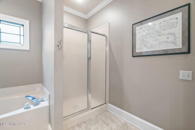 Welcome to your dream lifestyle in this show-stopping 3-bedroom on Hernando Hills Country Club in Mississippi - for sale on GolfHomes.com, golf home, golf lot