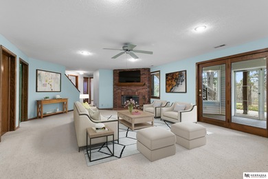 Experience the warmth of a close-knit neighborhood of around 100 on Woodland Hills Golf Course in Nebraska - for sale on GolfHomes.com, golf home, golf lot