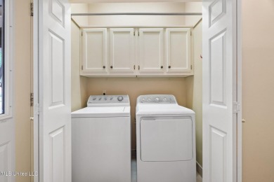 Welcome to your dream lifestyle in this show-stopping 3-bedroom on Hernando Hills Country Club in Mississippi - for sale on GolfHomes.com, golf home, golf lot