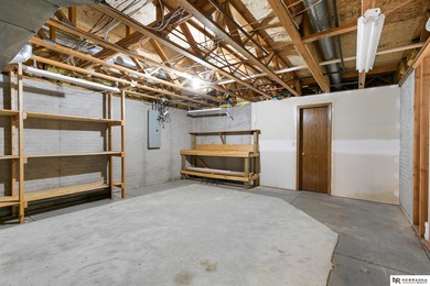 Experience the warmth of a close-knit neighborhood of around 100 on Woodland Hills Golf Course in Nebraska - for sale on GolfHomes.com, golf home, golf lot