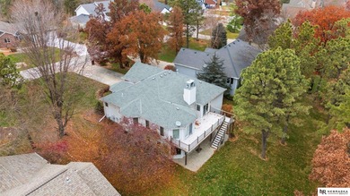 Experience the warmth of a close-knit neighborhood of around 100 on Woodland Hills Golf Course in Nebraska - for sale on GolfHomes.com, golf home, golf lot