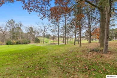 Experience the warmth of a close-knit neighborhood of around 100 on Woodland Hills Golf Course in Nebraska - for sale on GolfHomes.com, golf home, golf lot