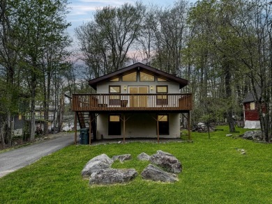 POCONOS CHARMING CHALET STYLE RAISED RANCH Move-In Ready & on Pocono Farms Country Club in Pennsylvania - for sale on GolfHomes.com, golf home, golf lot
