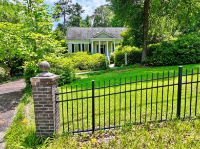 Step into a Southern storybook. Nestled beneath a canopy of on Jackson Links Golf Course in Alabama - for sale on GolfHomes.com, golf home, golf lot