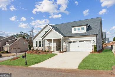 Beautiful Ranch-Style Home in the Tranquil Golf Course Community on Traditions of Braselton Golf Club in Georgia - for sale on GolfHomes.com, golf home, golf lot