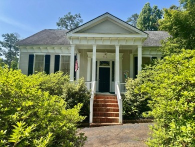 Step into a Southern storybook. Nestled beneath a canopy of on Jackson Links Golf Course in Alabama - for sale on GolfHomes.com, golf home, golf lot