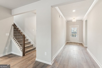 Beautiful Ranch-Style Home in the Tranquil Golf Course Community on Traditions of Braselton Golf Club in Georgia - for sale on GolfHomes.com, golf home, golf lot