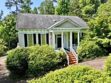 Step into a Southern storybook. Nestled beneath a canopy of on Jackson Links Golf Course in Alabama - for sale on GolfHomes.com, golf home, golf lot