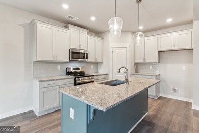 Beautiful Ranch-Style Home in the Tranquil Golf Course Community on Traditions of Braselton Golf Club in Georgia - for sale on GolfHomes.com, golf home, golf lot