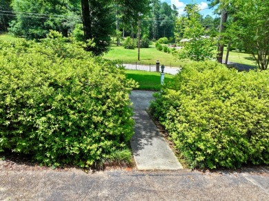 Step into a Southern storybook. Nestled beneath a canopy of on Jackson Links Golf Course in Alabama - for sale on GolfHomes.com, golf home, golf lot
