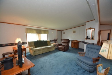 Well-maintained 3BR/2BA double-wide in a fantastic community on Winding Creek Executive Course in New York - for sale on GolfHomes.com, golf home, golf lot