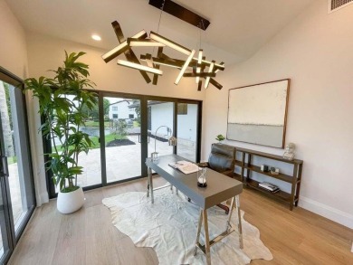 Welcome to 910 Greensward Ln, a stunning contemporary on Seagate Country Club in Florida - for sale on GolfHomes.com, golf home, golf lot