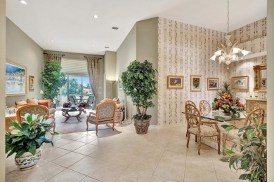 Nestled within the exclusive enclave of Palm Bay in Ballenisles on BallenIsles Golf and Country Club in Florida - for sale on GolfHomes.com, golf home, golf lot