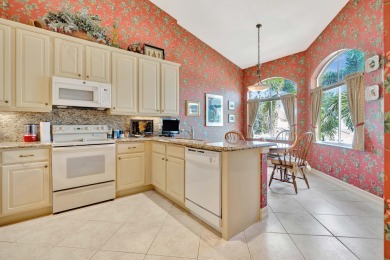 Nestled within the exclusive enclave of Palm Bay in Ballenisles on BallenIsles Golf and Country Club in Florida - for sale on GolfHomes.com, golf home, golf lot