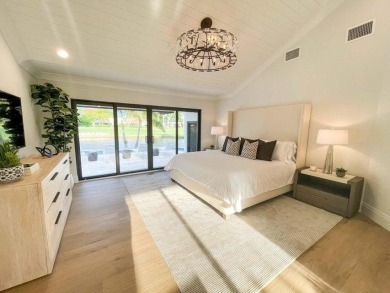 Welcome to 910 Greensward Ln, a stunning contemporary on Seagate Country Club in Florida - for sale on GolfHomes.com, golf home, golf lot