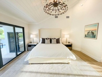 Welcome to 910 Greensward Ln, a stunning contemporary on Seagate Country Club in Florida - for sale on GolfHomes.com, golf home, golf lot