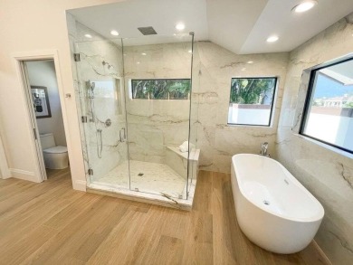 Welcome to 910 Greensward Ln, a stunning contemporary on Seagate Country Club in Florida - for sale on GolfHomes.com, golf home, golf lot