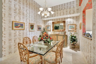 Nestled within the exclusive enclave of Palm Bay in Ballenisles on BallenIsles Golf and Country Club in Florida - for sale on GolfHomes.com, golf home, golf lot