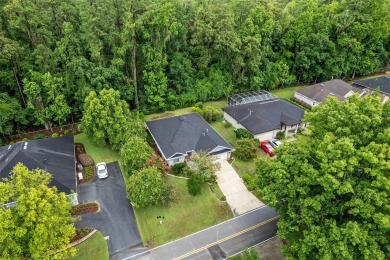 Between the rolling greens of Turkey Creek and the lush forest on Turkey Creek Golf and Country Club in Florida - for sale on GolfHomes.com, golf home, golf lot