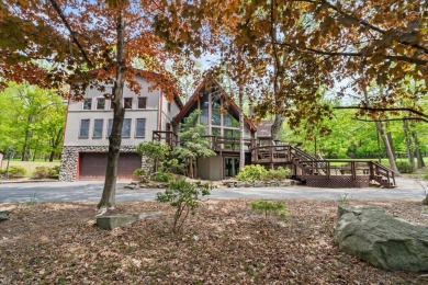 Situated on the golf course in Tanglwood Lakes, this stunning on Paupack Hills Golf and Country Club in Pennsylvania - for sale on GolfHomes.com, golf home, golf lot