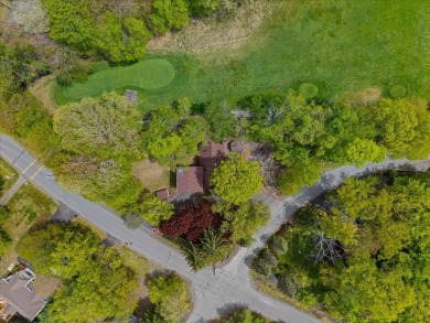 Situated on the golf course in Tanglwood Lakes, this stunning on Paupack Hills Golf and Country Club in Pennsylvania - for sale on GolfHomes.com, golf home, golf lot