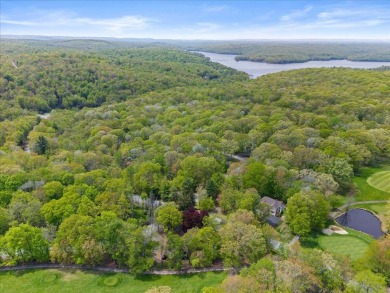 Situated on the golf course in Tanglwood Lakes, this stunning on Paupack Hills Golf and Country Club in Pennsylvania - for sale on GolfHomes.com, golf home, golf lot