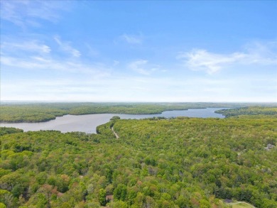 Situated on the golf course in Tanglwood Lakes, this stunning on Paupack Hills Golf and Country Club in Pennsylvania - for sale on GolfHomes.com, golf home, golf lot