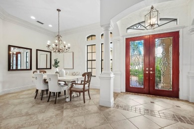 This gorgeous custom Lee Wetherington home is poised on one of on Lakewood Ranch Golf and Country Club in Florida - for sale on GolfHomes.com, golf home, golf lot