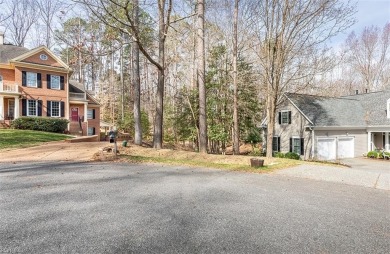 This serene wooded lot in Ford's Colony features a gentle slope on Fords Colony Country Club in Virginia - for sale on GolfHomes.com, golf home, golf lot