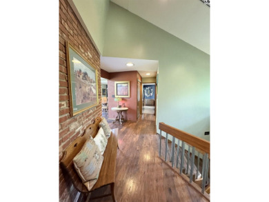 Privately set on a quiet drive, this Colorado-style home offers on Prairie Dunes Country Club in Kansas - for sale on GolfHomes.com, golf home, golf lot