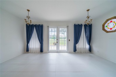 This exquisite home shows like a model. All tile floors on The Club Renaissance in Florida - for sale on GolfHomes.com, golf home, golf lot