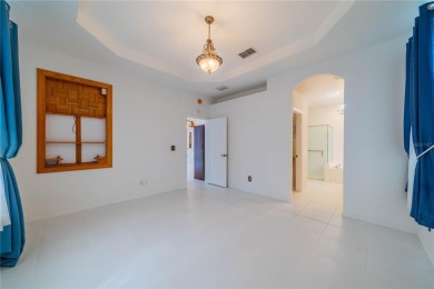 This exquisite home shows like a model. All tile floors on The Club Renaissance in Florida - for sale on GolfHomes.com, golf home, golf lot