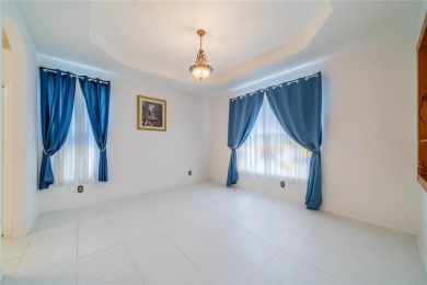 This exquisite home shows like a model. All tile floors on The Club Renaissance in Florida - for sale on GolfHomes.com, golf home, golf lot
