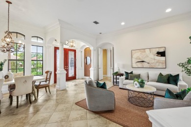 This gorgeous custom Lee Wetherington home is poised on one of on Lakewood Ranch Golf and Country Club in Florida - for sale on GolfHomes.com, golf home, golf lot