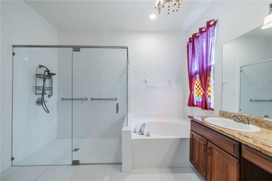 This exquisite home shows like a model. All tile floors on The Club Renaissance in Florida - for sale on GolfHomes.com, golf home, golf lot