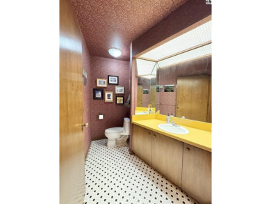 Privately set on a quiet drive, this Colorado-style home offers on Prairie Dunes Country Club in Kansas - for sale on GolfHomes.com, golf home, golf lot