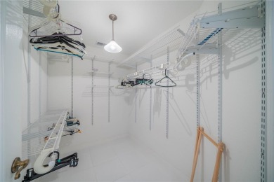 This exquisite home shows like a model. All tile floors on The Club Renaissance in Florida - for sale on GolfHomes.com, golf home, golf lot