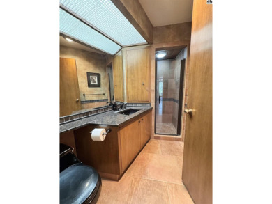 Privately set on a quiet drive, this Colorado-style home offers on Prairie Dunes Country Club in Kansas - for sale on GolfHomes.com, golf home, golf lot