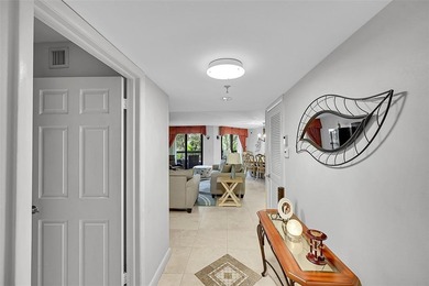 Rarely available, this spacious 1,750 sq ft residence features on Pompano Beach Golf Course  in Florida - for sale on GolfHomes.com, golf home, golf lot