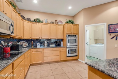 Located above the 9th fairway boasting 2,542 sq ft featuring on Heritage Highlands At Dove Mountain in Arizona - for sale on GolfHomes.com, golf home, golf lot