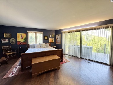 Privately set on a quiet drive, this Colorado-style home offers on Prairie Dunes Country Club in Kansas - for sale on GolfHomes.com, golf home, golf lot