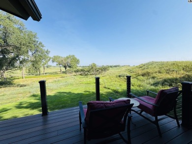 Privately set on a quiet drive, this Colorado-style home offers on Prairie Dunes Country Club in Kansas - for sale on GolfHomes.com, golf home, golf lot