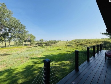 Privately set on a quiet drive, this Colorado-style home offers on Prairie Dunes Country Club in Kansas - for sale on GolfHomes.com, golf home, golf lot